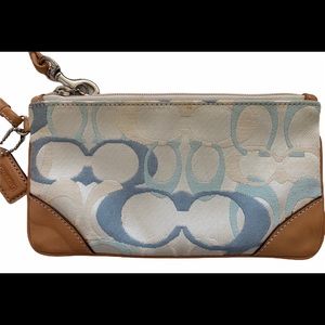 Used Coach leather & canvas blue & white wristlet